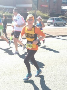 Debbie (minus shopping) looking strong at mile 25.